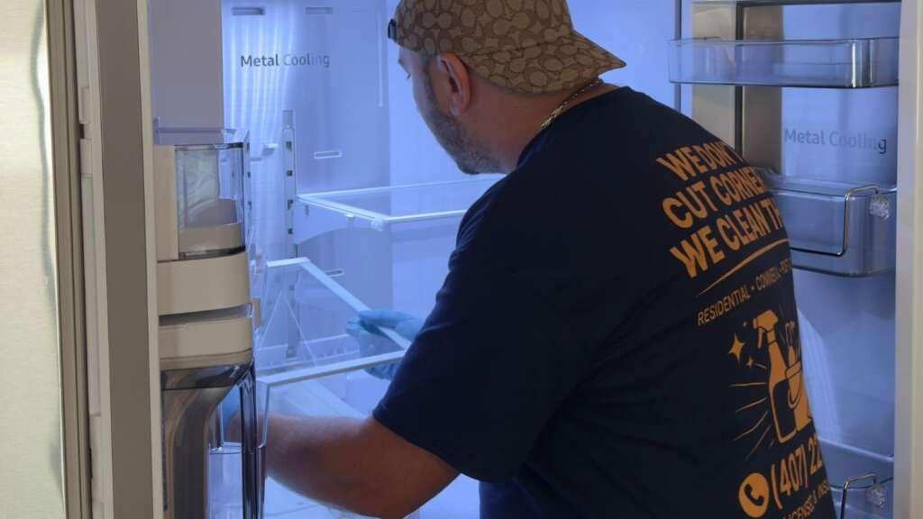 Dust Rush Cleaning cleaning inside a refrigerator in Oviedo FL